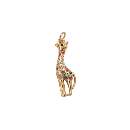 Gold giraffe charm with gemstones on a white background