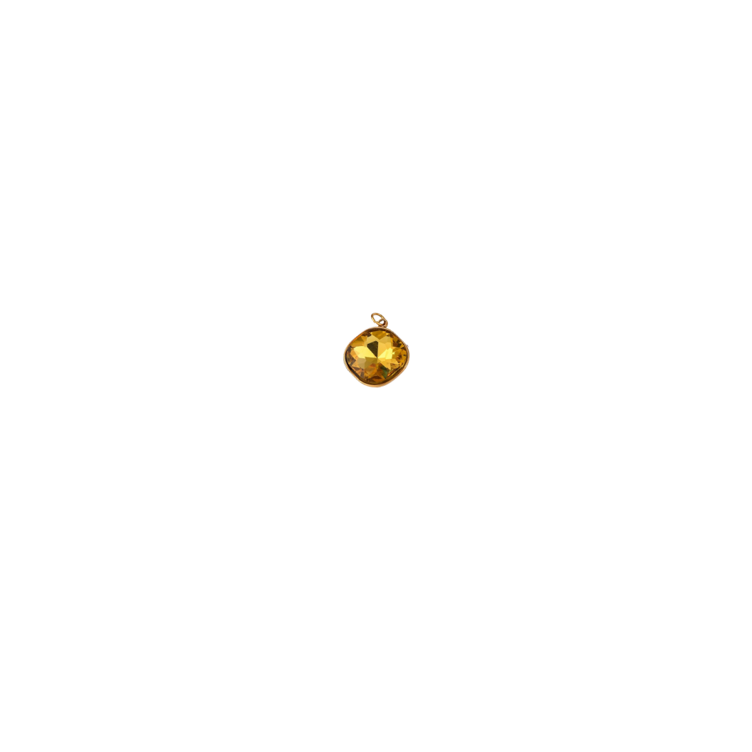 yellow gemstone on white background 