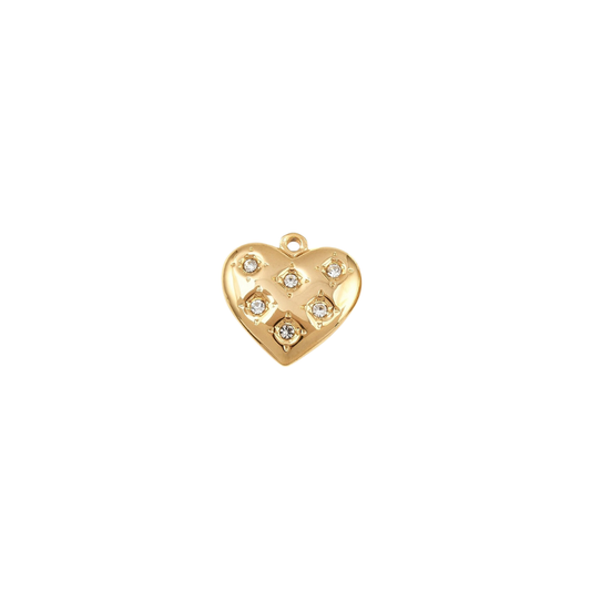 Gold heart-shaped pendant with embedded stones on a white background