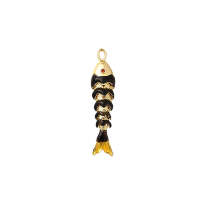 Gold and black fish-shaped pendant on a white background