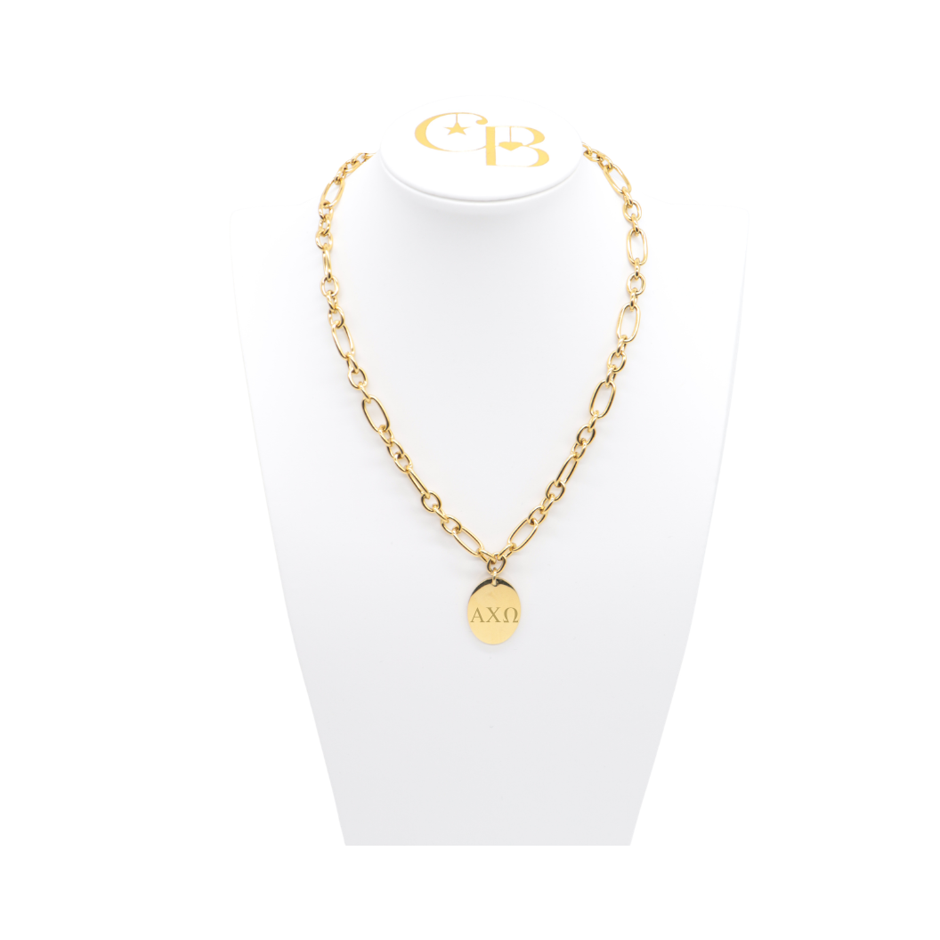 Alpha Chi Omega gold large link Keepsake Necklace with large oval charm with horizontal greek letters on white bust front view