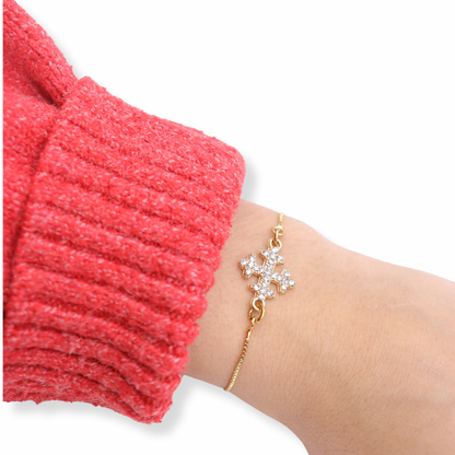 Front of the Gold Bolo Bracelet with Ornate Cross on wrist