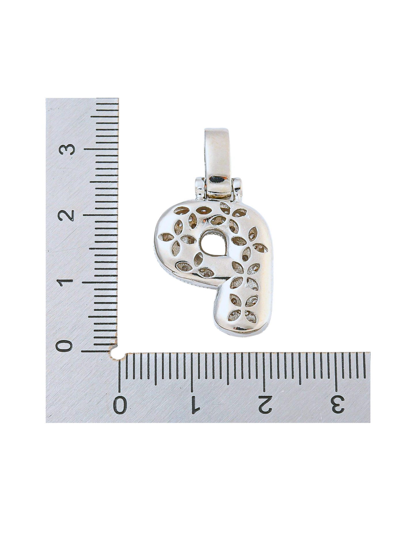 Back view of the Silver Rhinestone Bubble Letter "P" Charm with a ruler