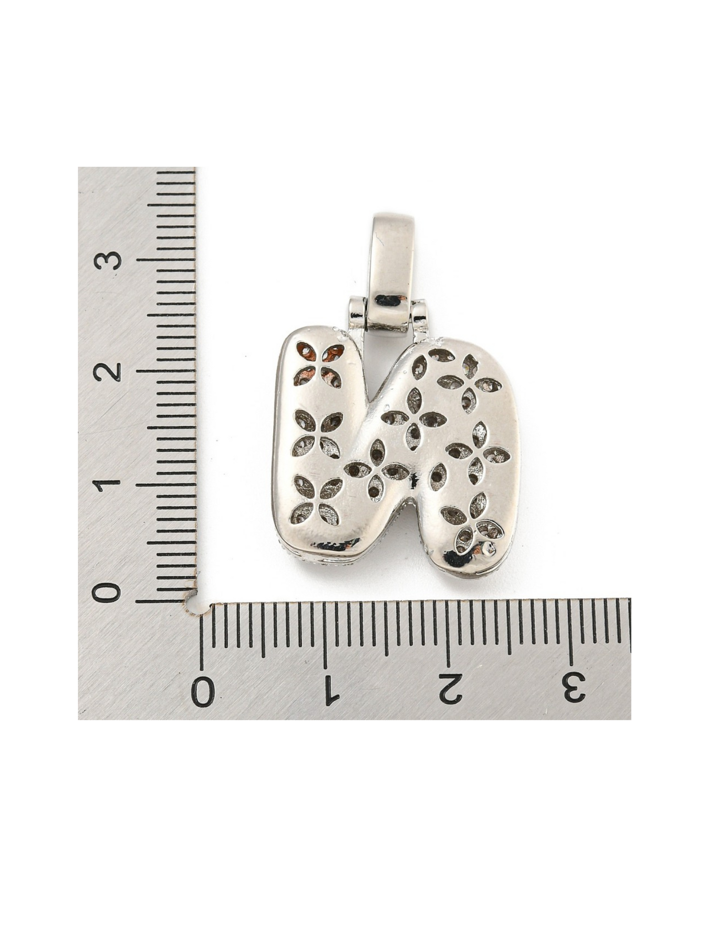 Back view of the Silver Rhinestone Bubble Letter "N" Charm with a ruler