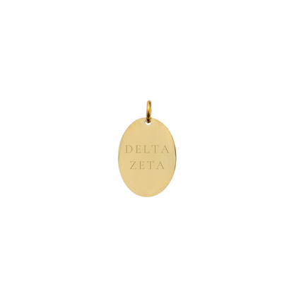 Delta Zeta gold small oval charm with full sorority name front view.