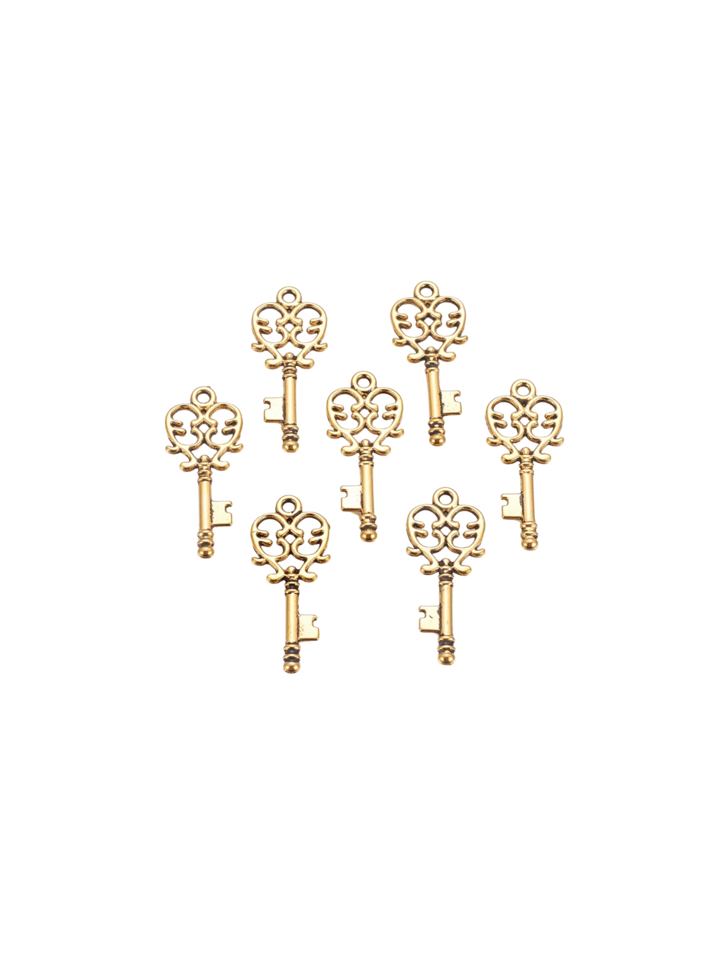 Group of Gold Antique Key Charm at various angles