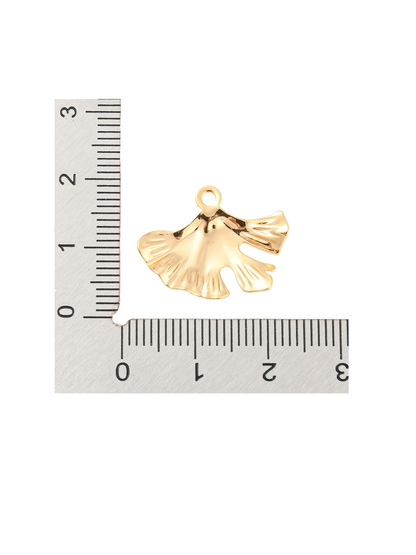 Front of the Gold Ginkgo Leaf Charm with a ruler