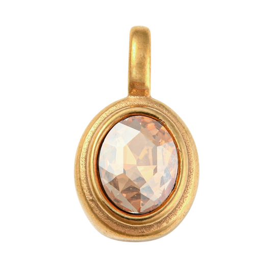 Front of the Gold Oval Framed Topaz Glass Stone Charm on a White Background