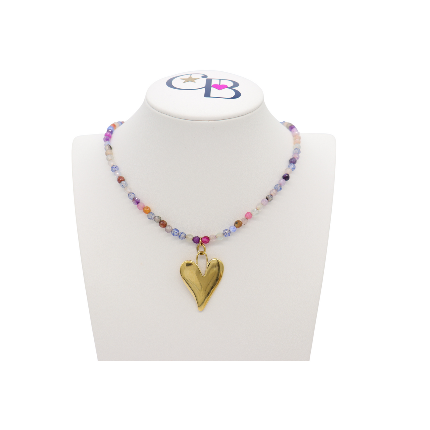 The Gold Statement Heart Charm on one of our Gold Beaded Necklaces