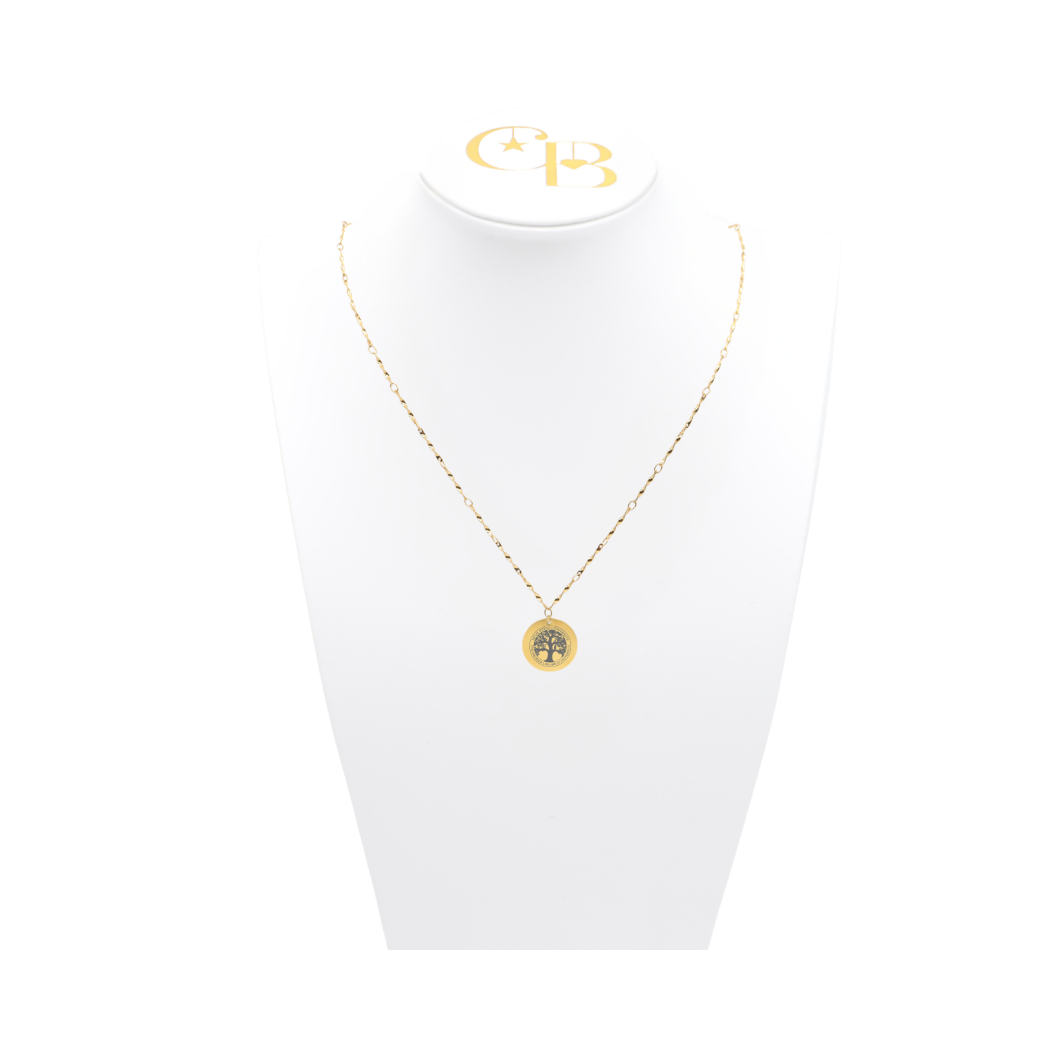 High Point University gold twist necklace with small round charm with high point university life skills tree on white pillow front view
