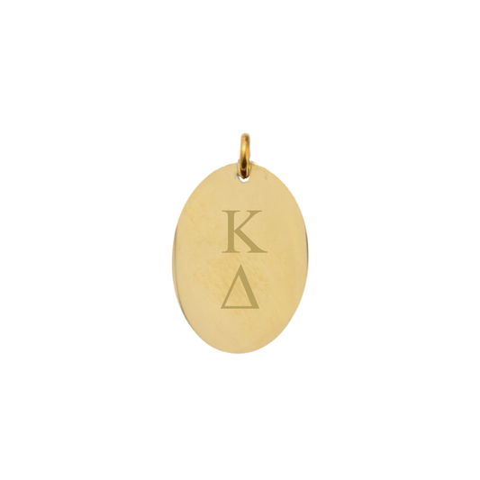 Kappa Delta gold large oval charm with vertical greek letters front view