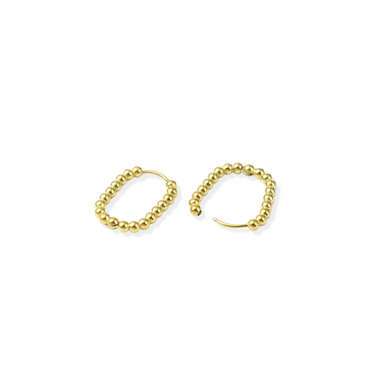 Side view of the Gold Oval Hoops | Pair