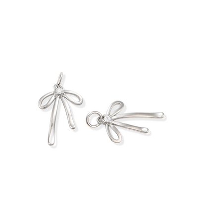 Front and side view of the Silver Coquette Bow Charm