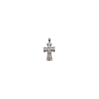 A silver charms featuring a carved cross design with a rounded 'bubble' effect.