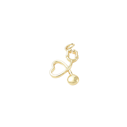 Gold baby rattle charm on a white background