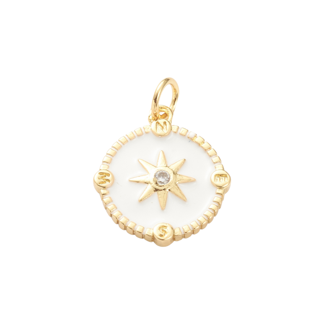Gold pendant with star design on a white background