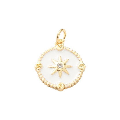 Gold pendant with star design on a white background