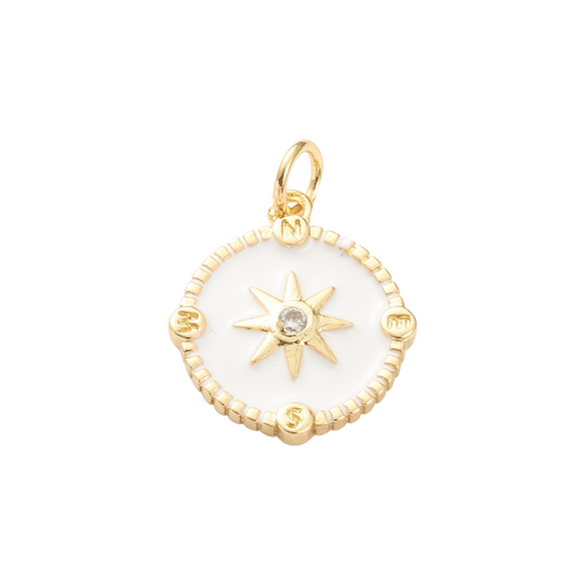 Gold pendant with star design on a white background