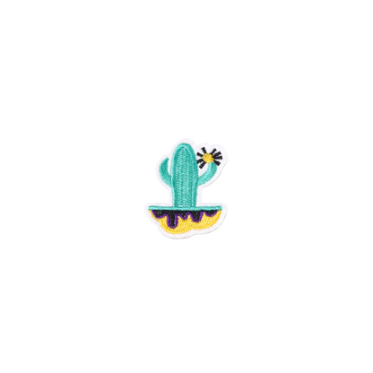 Embroidered patch of a cactus with a colorful design on a white background