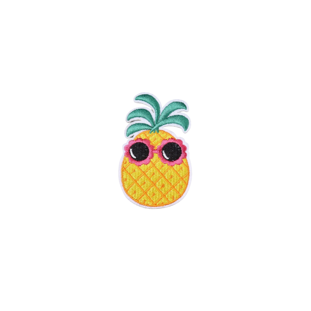 Pineapple with sunglasses on a white background