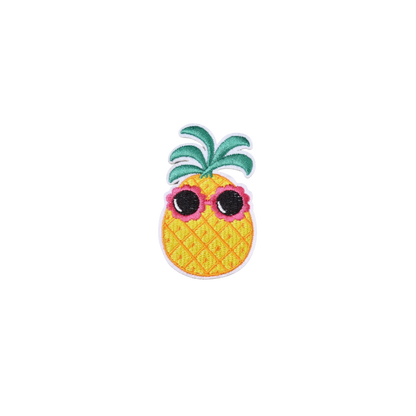 Pineapple with sunglasses on a white background