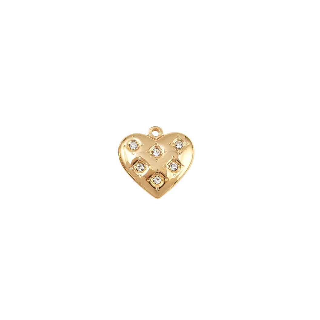 Gold heart-shaped pendant with embedded stones on a white background