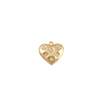 Gold heart-shaped pendant with embedded stones on a white background