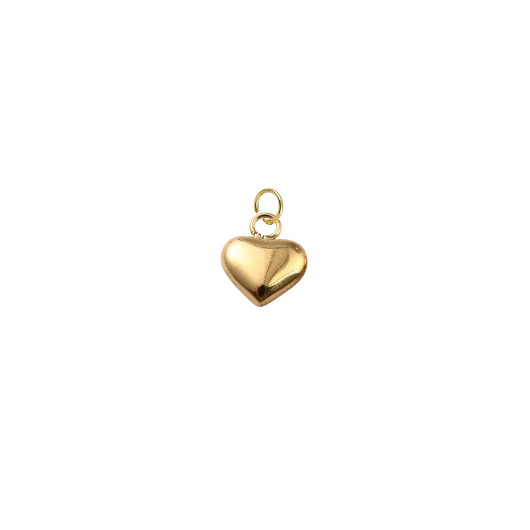 Gold heart-shaped pendant on a white background
