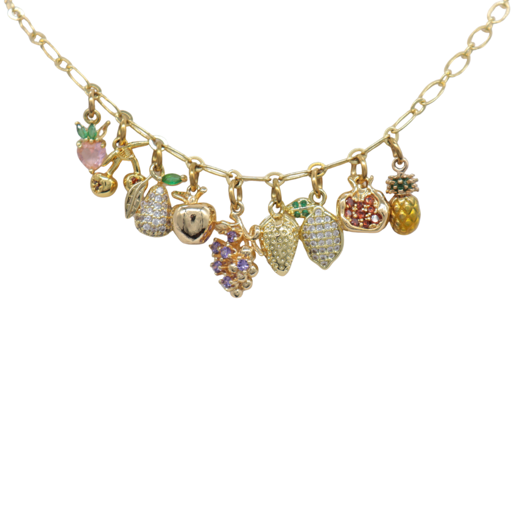 Necklace with various fruit-shaped charms on a white background