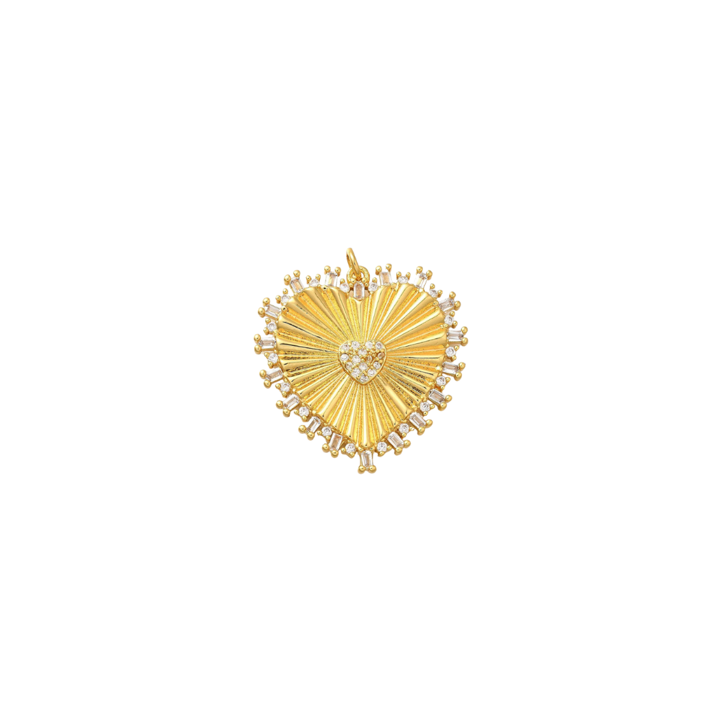 Gold heart-shaped brooch with辐射 design on a white background