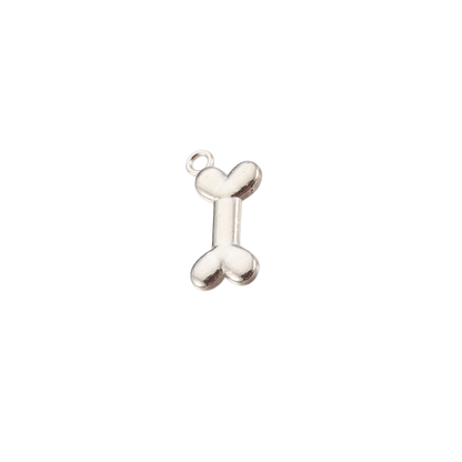 Silver bone-shaped charm on a white background