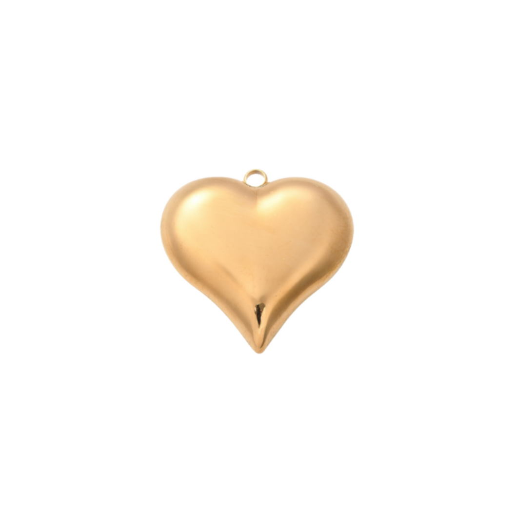 Gold heart-shaped pendant on a white background
