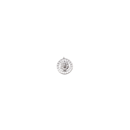 Silver ring with a circular design on a white background