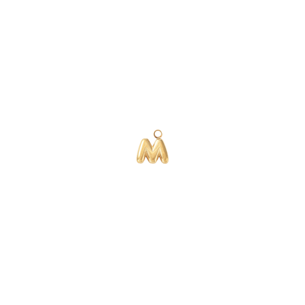 Gold pendant with 'M' letter on a white background