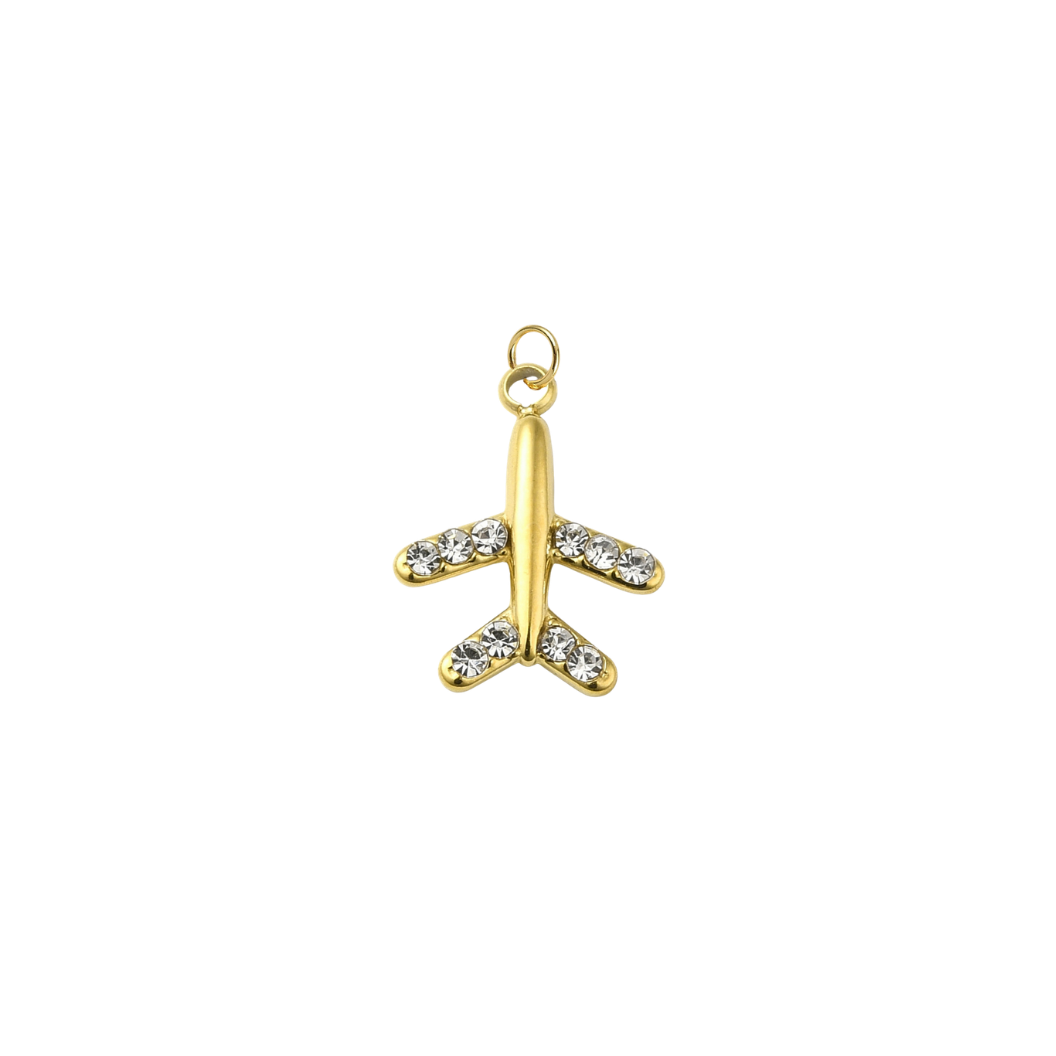 Gold airplane-shaped pendant with clear stones on a white background