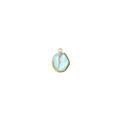 Gold aqua gemstone charm on a white background
