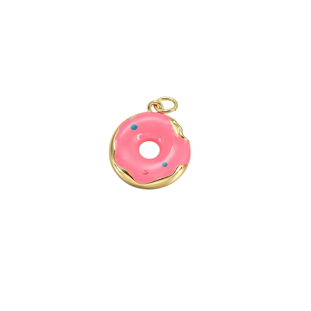Pink donut charm with gold border on a white background