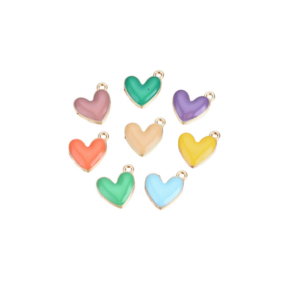 Set of colorful heart-shaped pendants on a white background