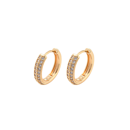 Gold hoop earrings with embedded stones on a white background
