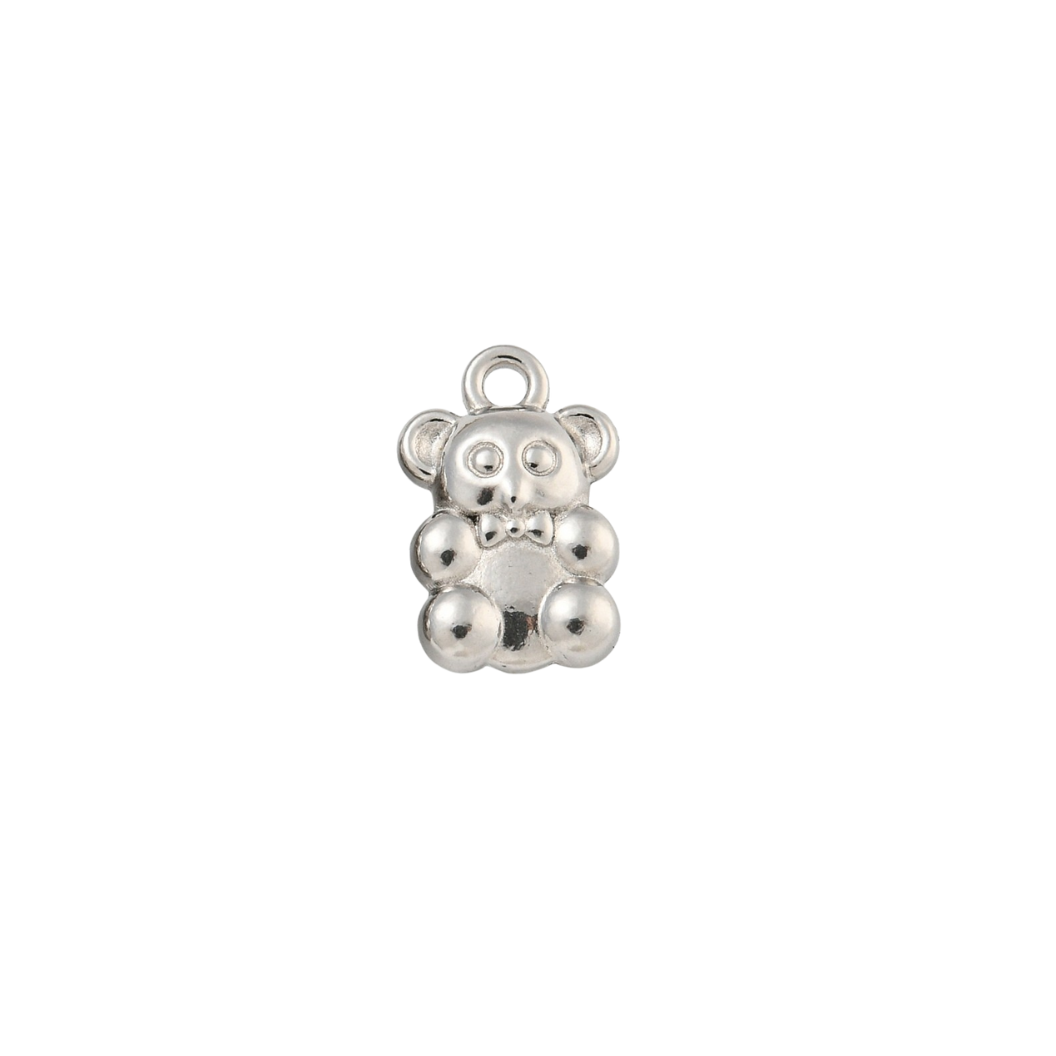 Silver teddy bear charm on a white background