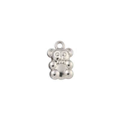 Silver teddy bear charm on a white background