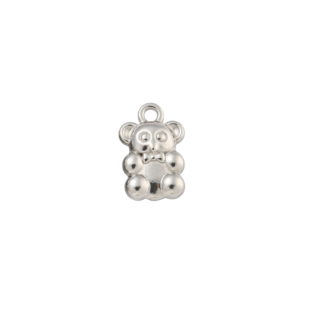 Silver teddy bear charm on a white background