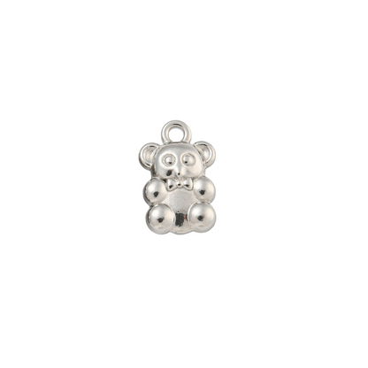 Silver teddy bear charm on a white background
