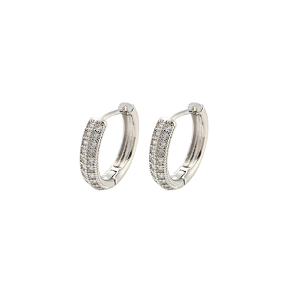 Pair of silver hoop earrings on a white background