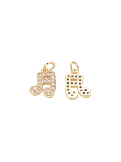 Front and back of the Gold Cubic Zirconia Musical Note Charm