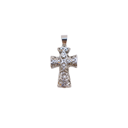 Silver cross pendant on a white background