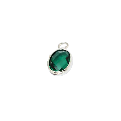 Green gemstone pendant on a white background