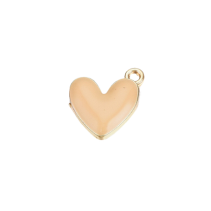 Gold heart-shaped charm on a clear background