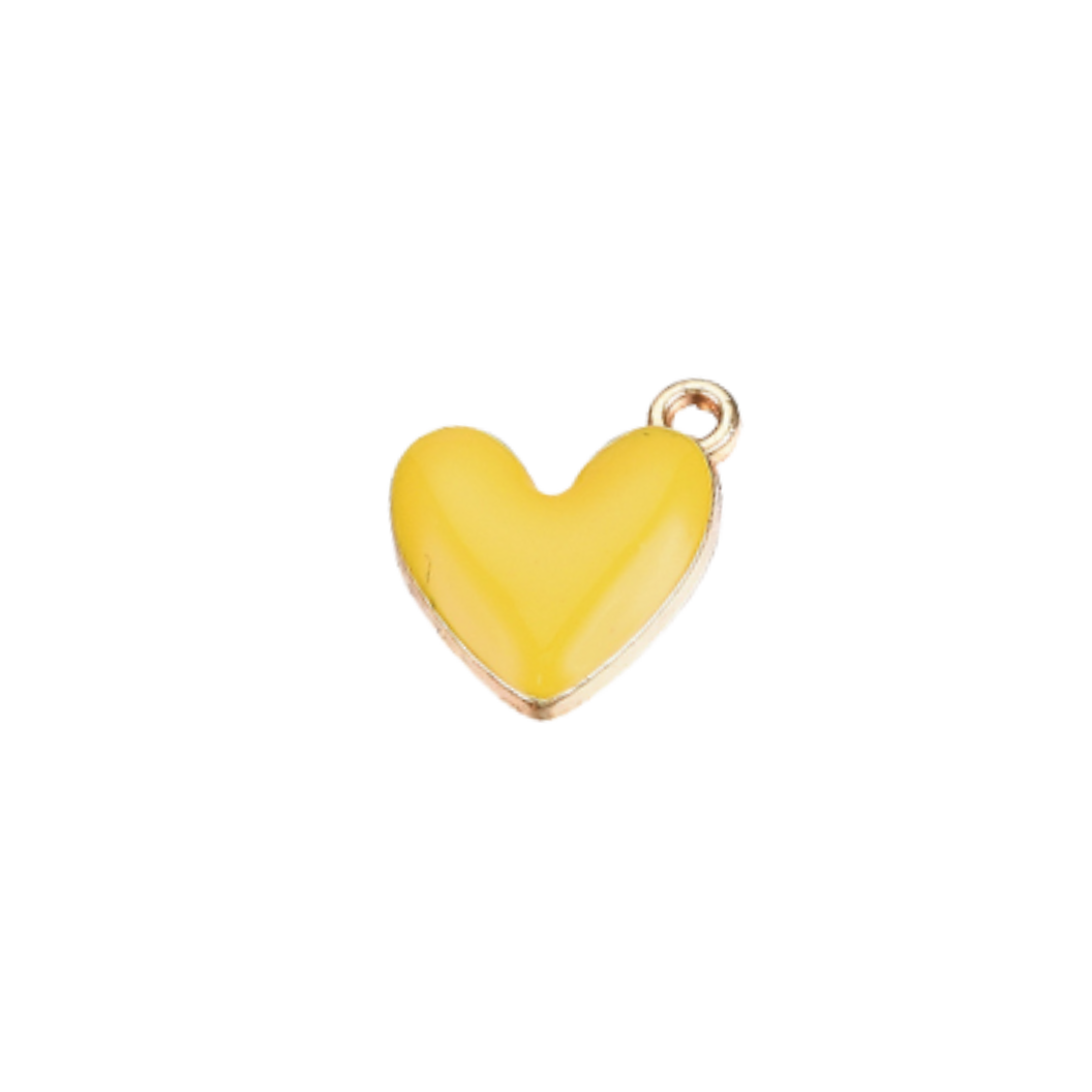 Yellow heart-shaped pendant on a white background
