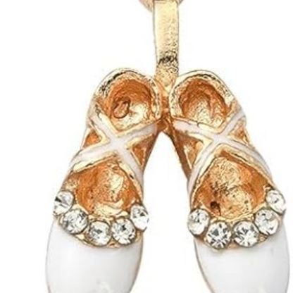 A collection of ballet slipper charms in assorted colors with gold accents.